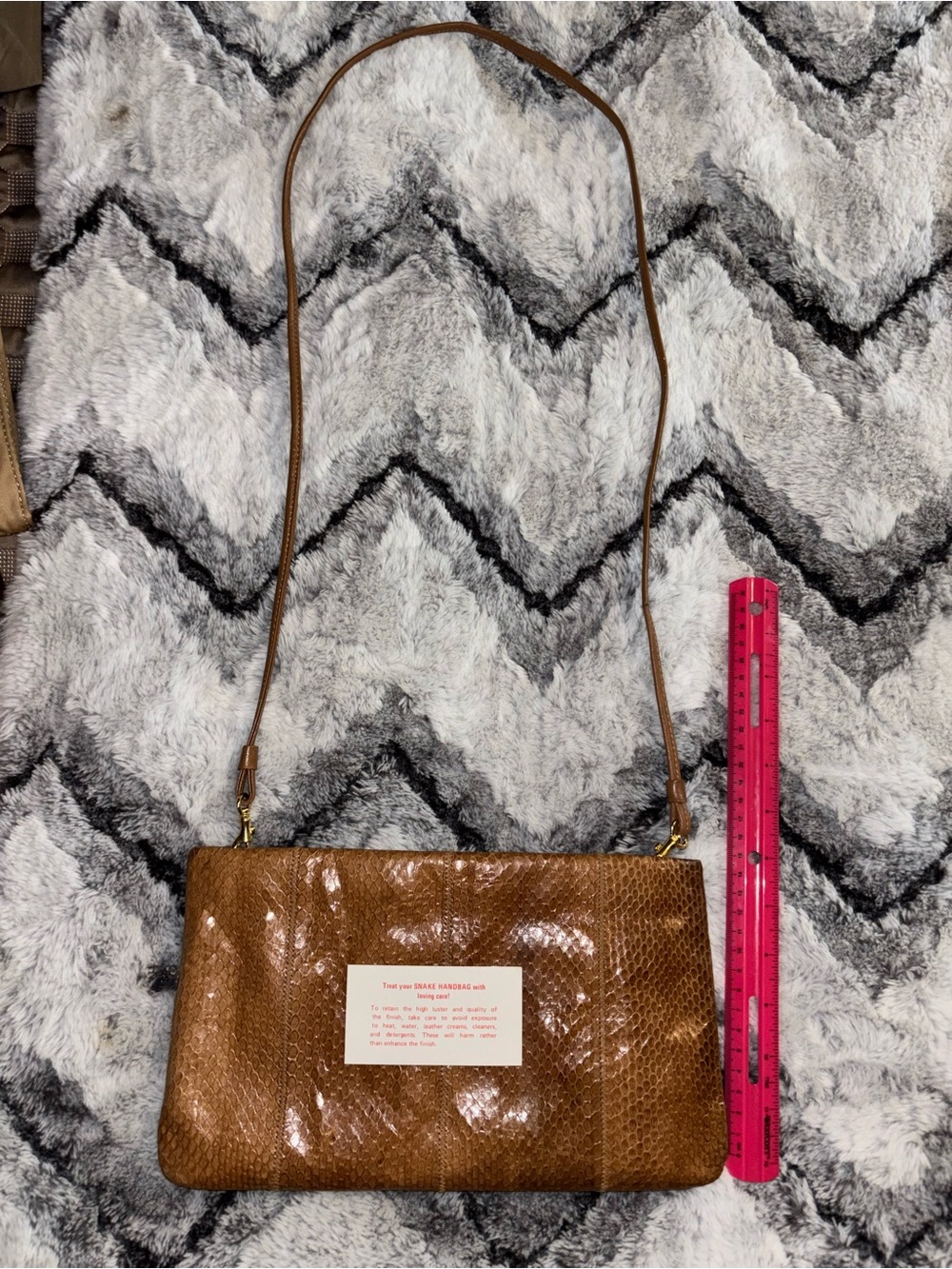 Authentic snake skin crossbody that doubles as just wristlet. Or evening kluch